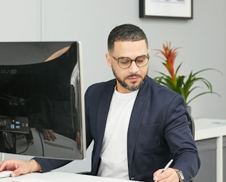 a man sitting at a desk
