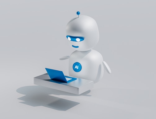 A small, round robot with a smooth white surface and blue accents operates a blue laptop on a sleek, floating platform. The robot has glowing eyes and an antenna on its head, with an 'AI' emblem on its front.
